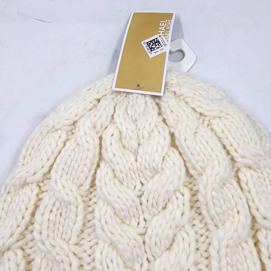 Michael Michael Kors Moving Cables Knit Hat Women's Cream Ribbed Logo Charm