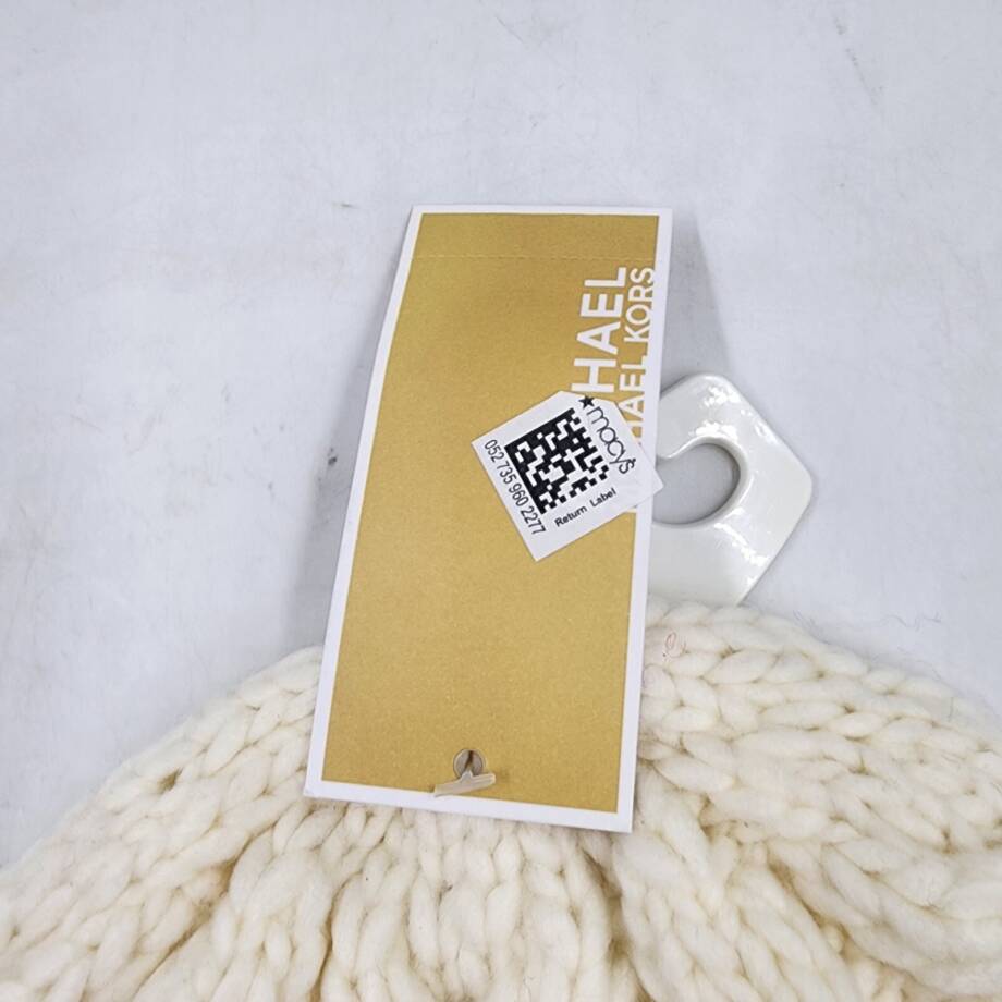 Michael Michael Kors Moving Cables Knit Hat Women's Cream Ribbed Logo Charm