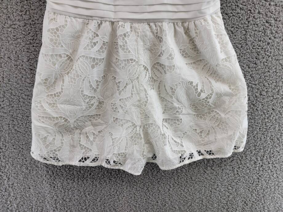 GUESS Chloe Ruffle-Sleeve Eyelet Smocked Romper Women's L White Back Zip S/S