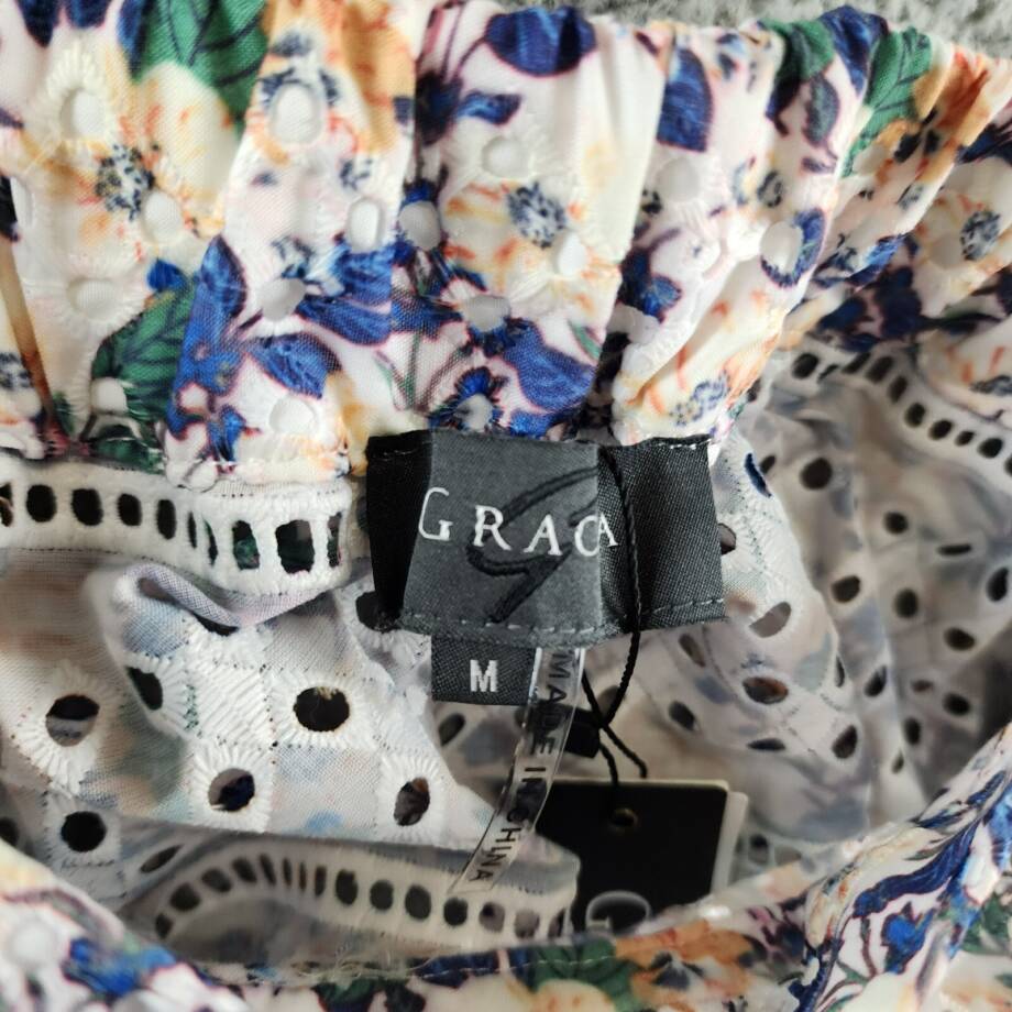 Gracia Floral Eyelet Hi-Low Top Women's M Multi Open Back Short Sleeve Pullover