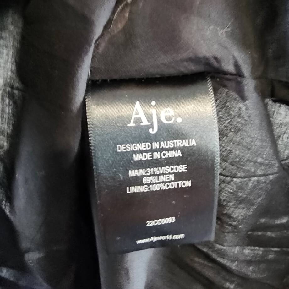 Aje. Mimosa Cut Out Mini Dress Women's 6 Black Side Seam Pockets Short Sleeves